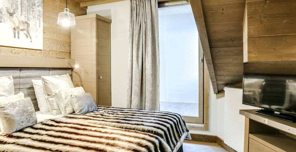 Эта квартира, состоящая из трех спален с ванными комнатами 