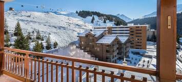 The flat is a large two bedroom flat located in Courchevel 