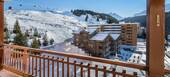 The flat is a large two bedroom flat located in Courchevel 