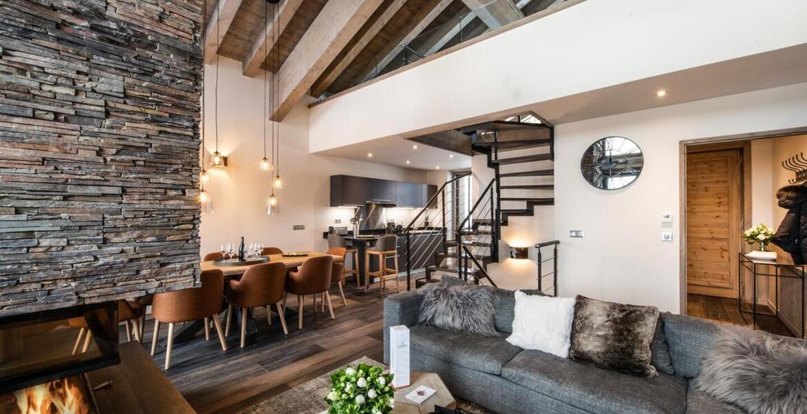 Le chalet situé à l'intérieur d'une résidence, de 173 m²