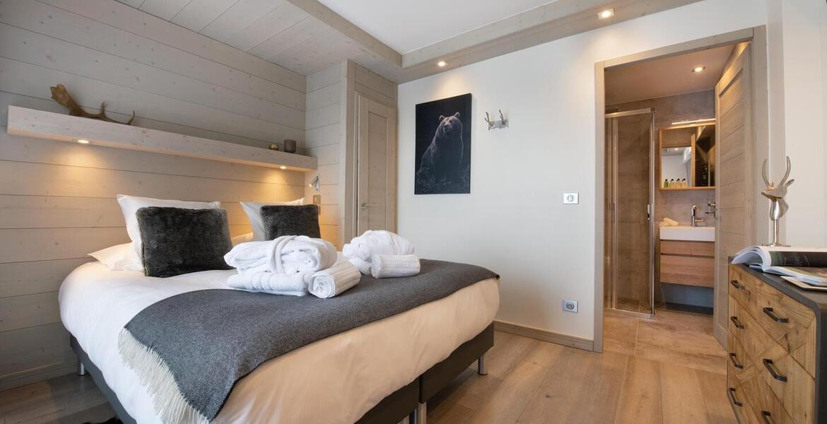 Vous offre un agréable espace de vie de 84m2 Courchevel 