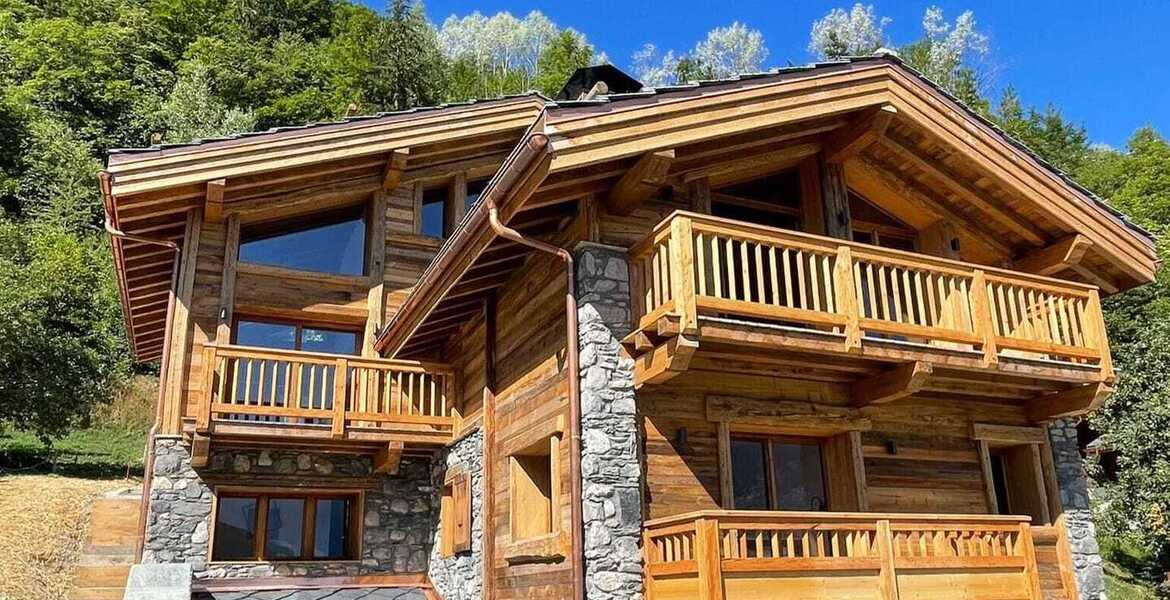 Un chalet familial avec piscine à Courchevel-Le Praz à louer