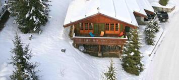 HÔTEL COURCHEVEL-CHALET À COURCHEVEL 1850. SÉJOUR LUXUEUX