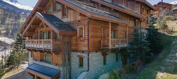 Chalet of about 575m² with lift and has 6 bedrooms for 12 