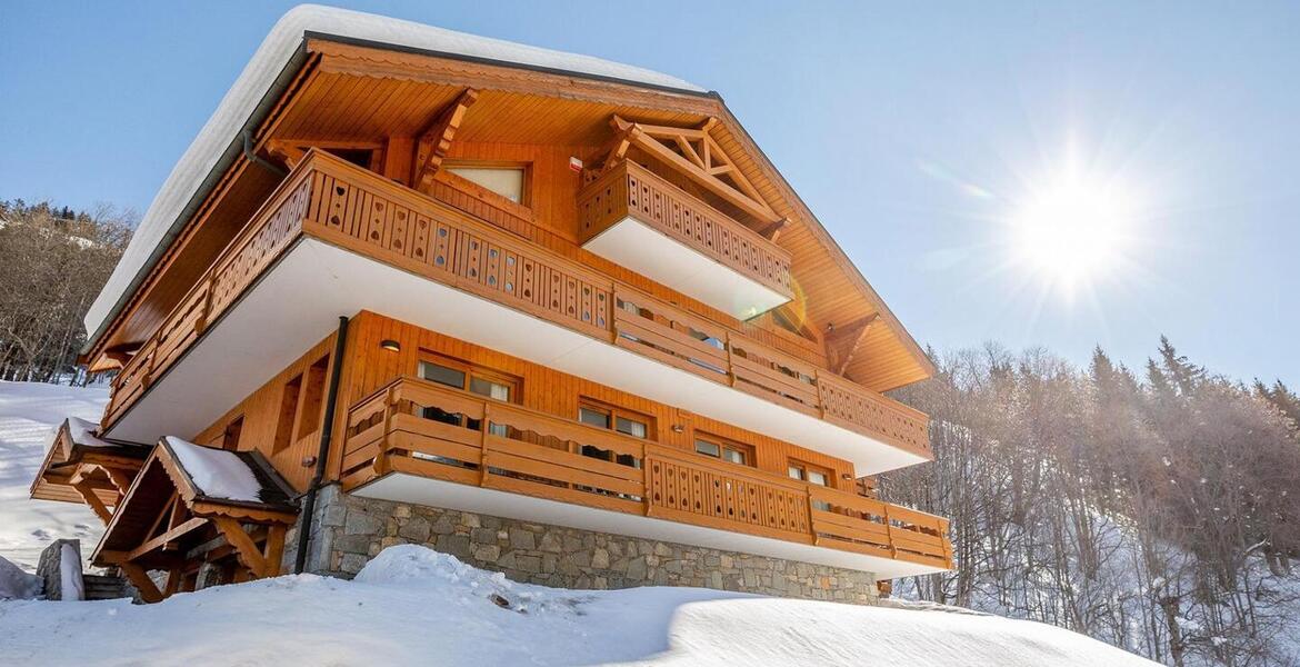 In the heart of Méribel, this ski-in, ski-out chalet