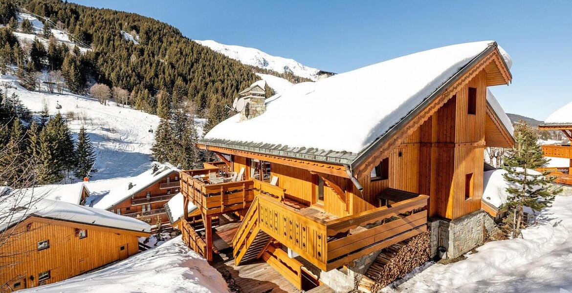 In the heart of Méribel, this ski-in, ski-out chalet