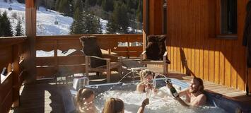 In the heart of Méribel, this ski-in, ski-out chalet