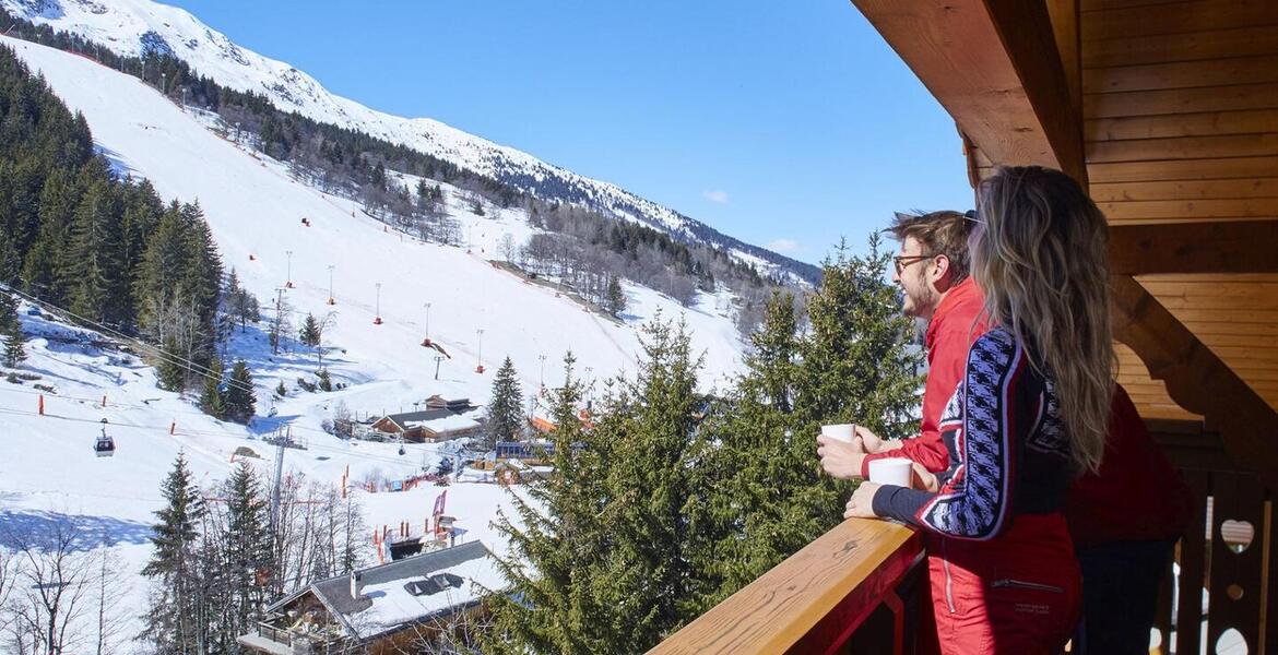 In the heart of Méribel, this ski-in, ski-out chalet