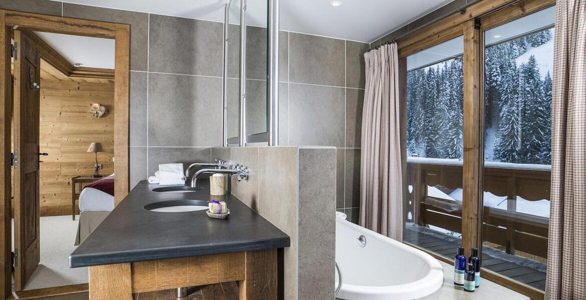 In the heart of Méribel, this ski-in, ski-out chalet