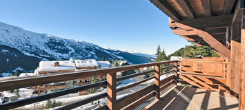 Magnifique appartement au cœur d'une résidence skis aux pied